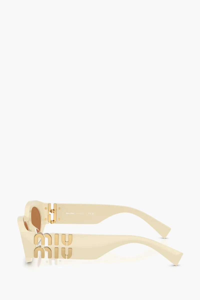 MIU MIU Logo Oval Sunglasses in Milk/Brown acetate 1