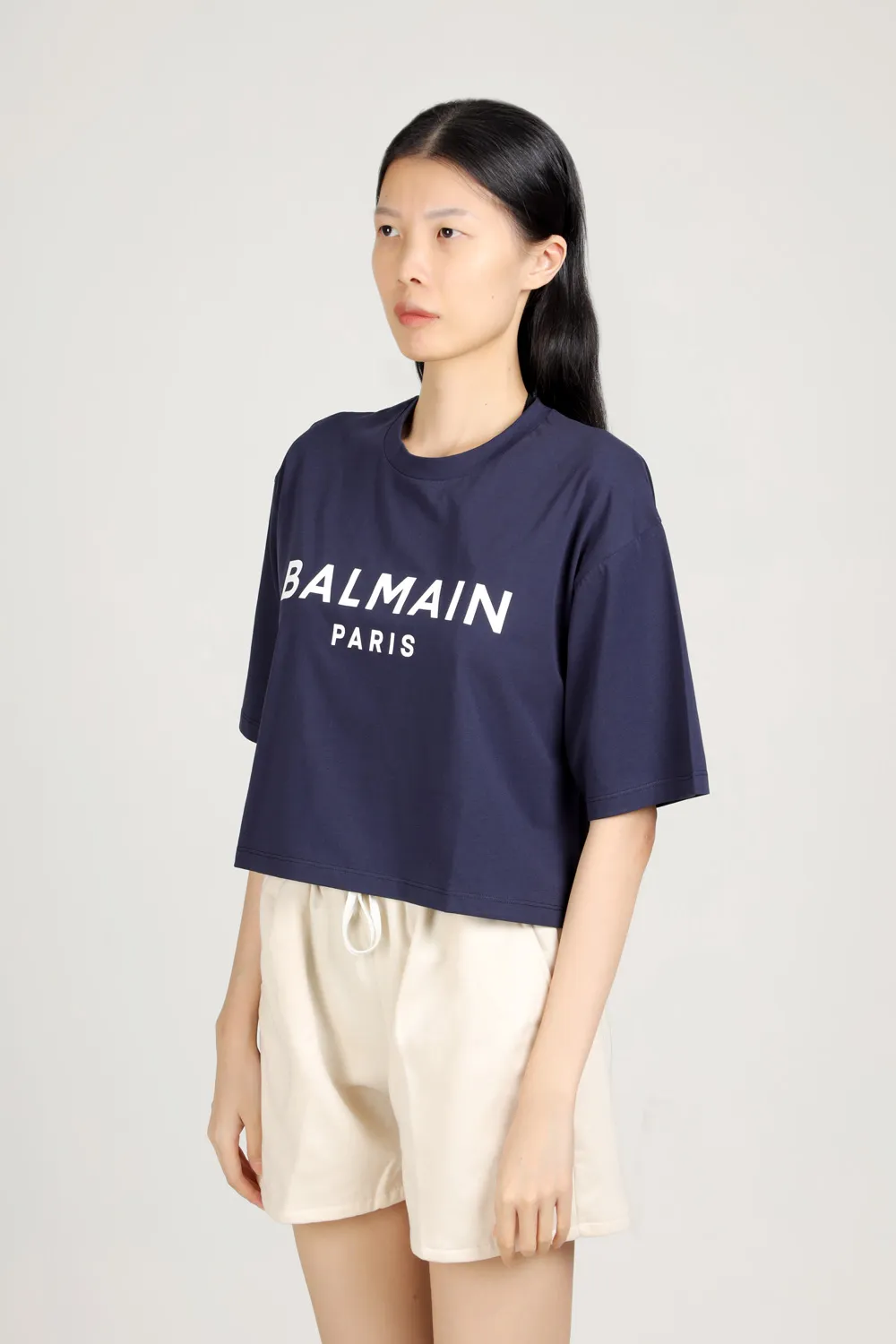 BALMAIN Women Balmain Paris Flocked Logo Cropped T-Shirt in Navy/White Eco-Designed Cotton 3