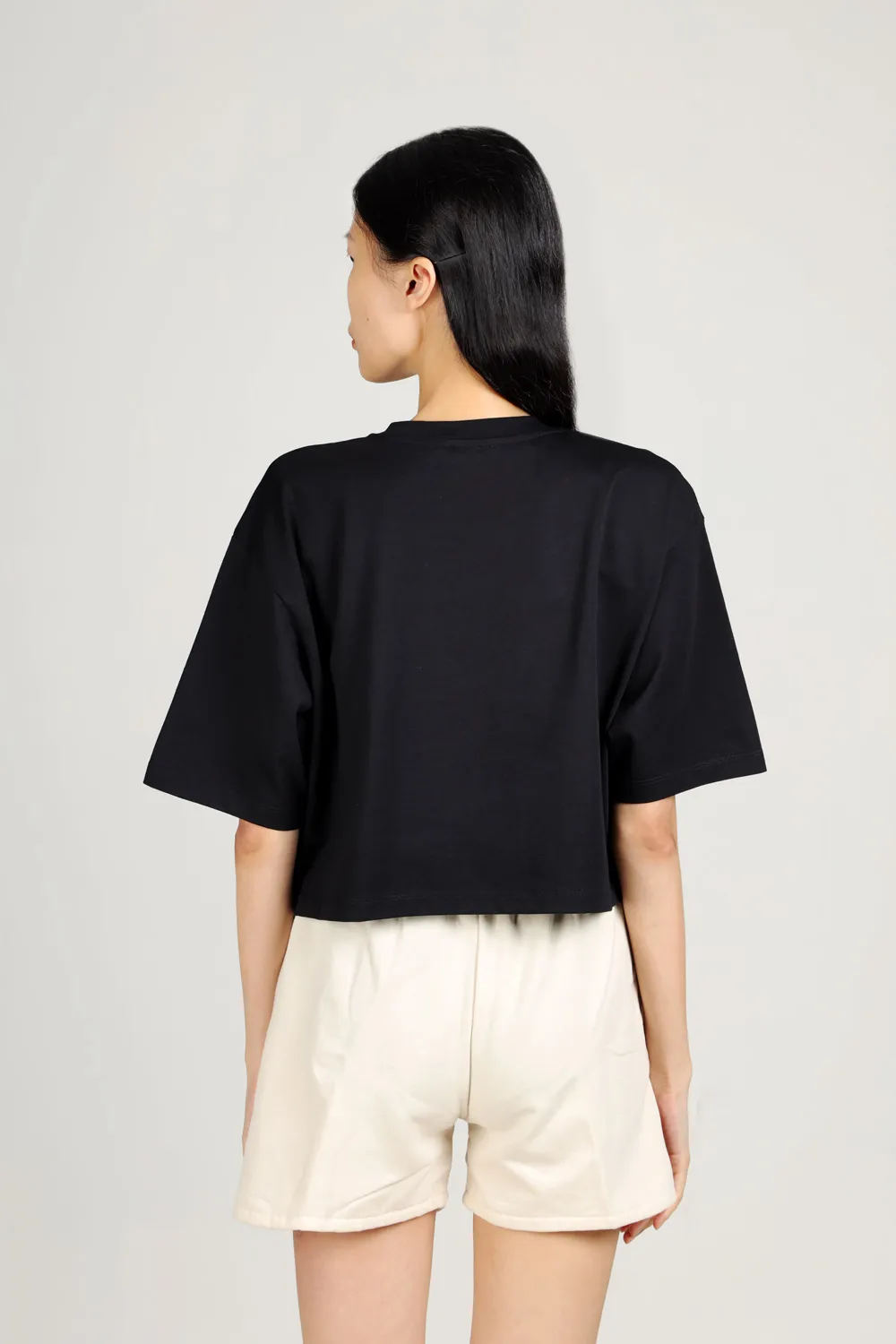 BALMAIN Women Graffiti Balmain Paris Small Flocked Logo Cropped T-Shirt in Black/White 2