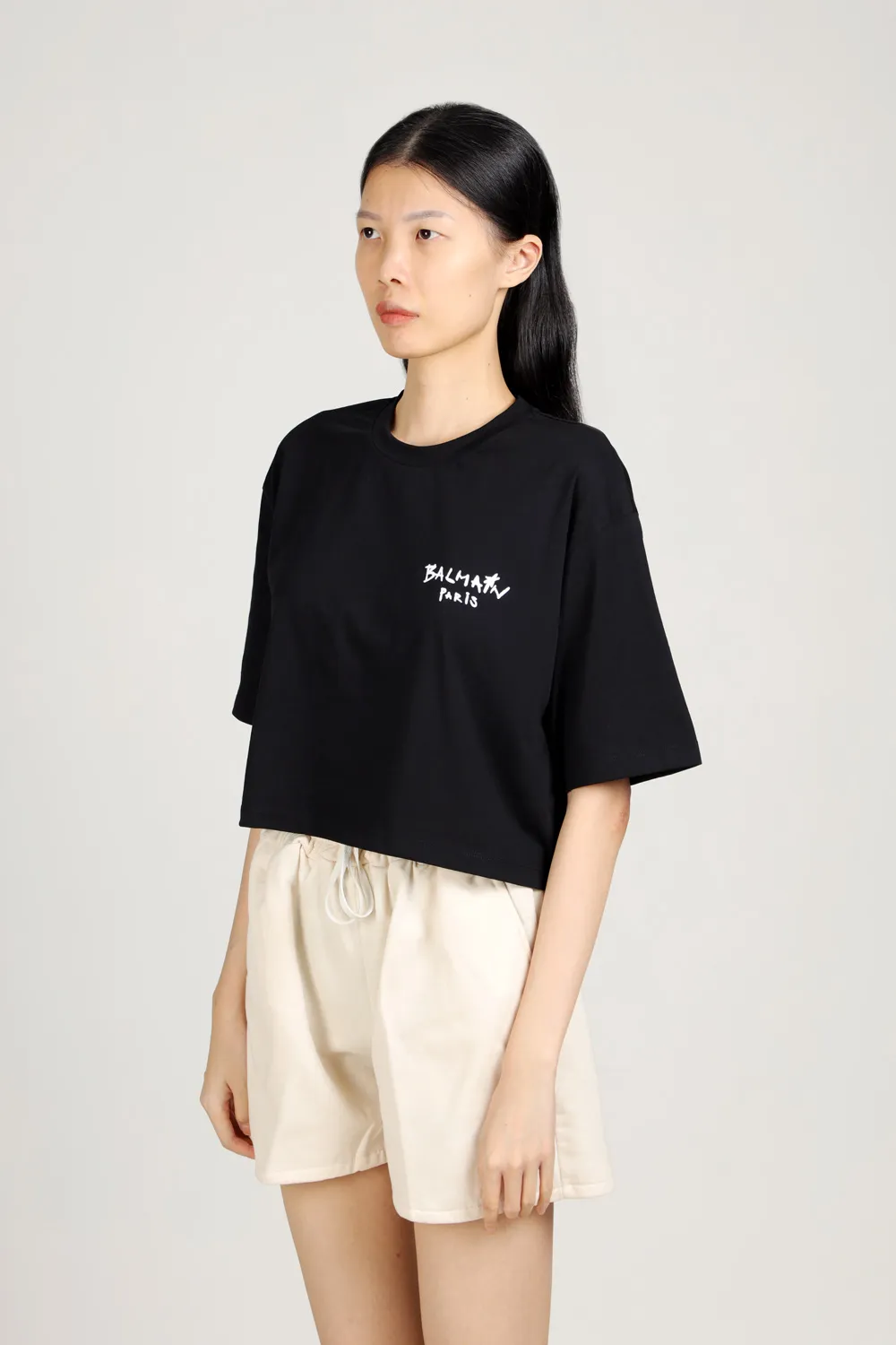 BALMAIN Women Graffiti Balmain Paris Small Flocked Logo Cropped T-Shirt in Black/White 3