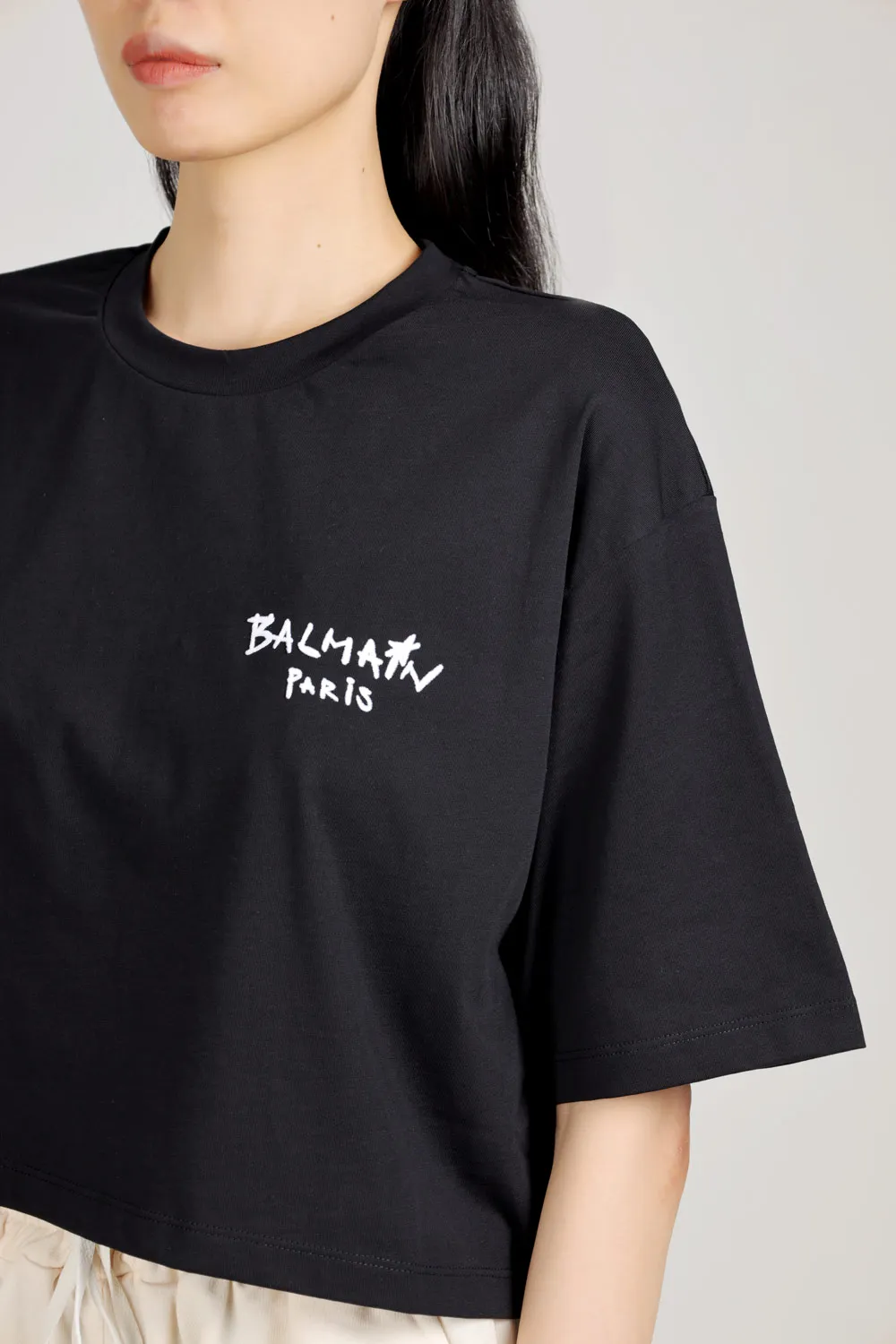 BALMAIN Women Graffiti Balmain Paris Small Flocked Logo Cropped T-Shirt in Black/White 4