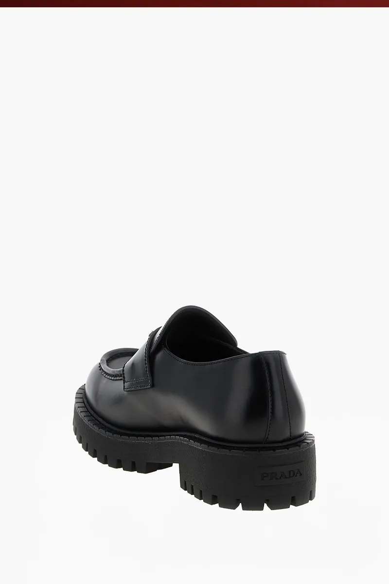 PRADA Men Metal Triangle Logo Double Chocolate Loafers in Black Brushed Leather 1