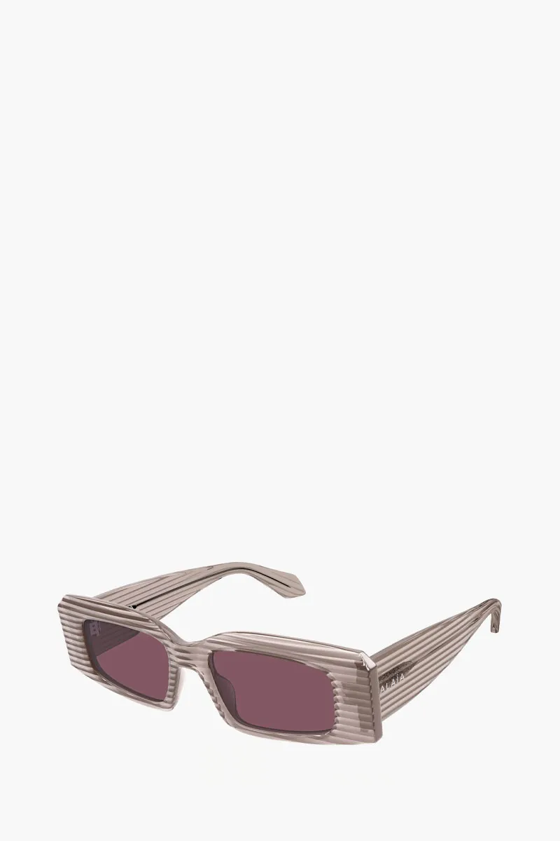ALAIA Rectangular sunglasses in Brown Transparent/Violet Acetate 1