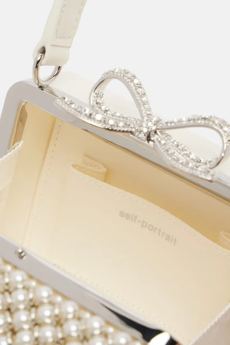 SELF-PORTRAIT Crystal Bow Pearl Embellished Micro Bag in Cream 4