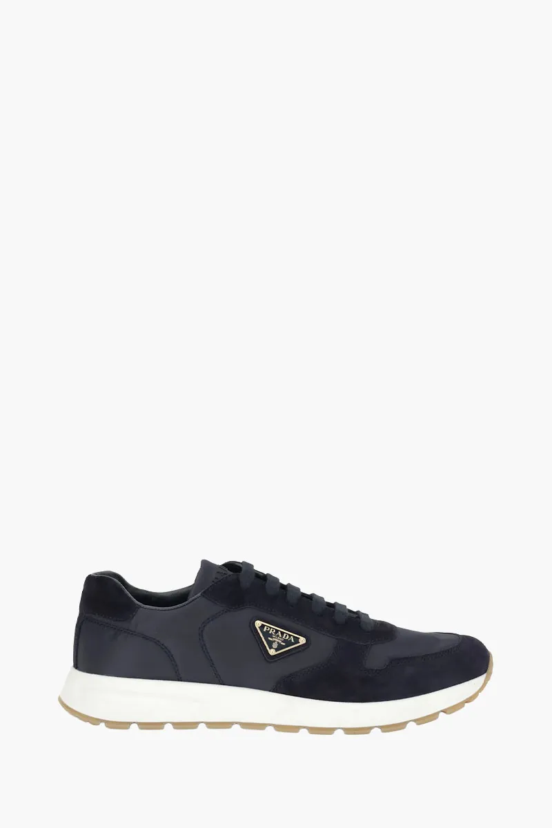 PRADA Men Prax 01 Low Top Sneakers in Navy Re-Nylon