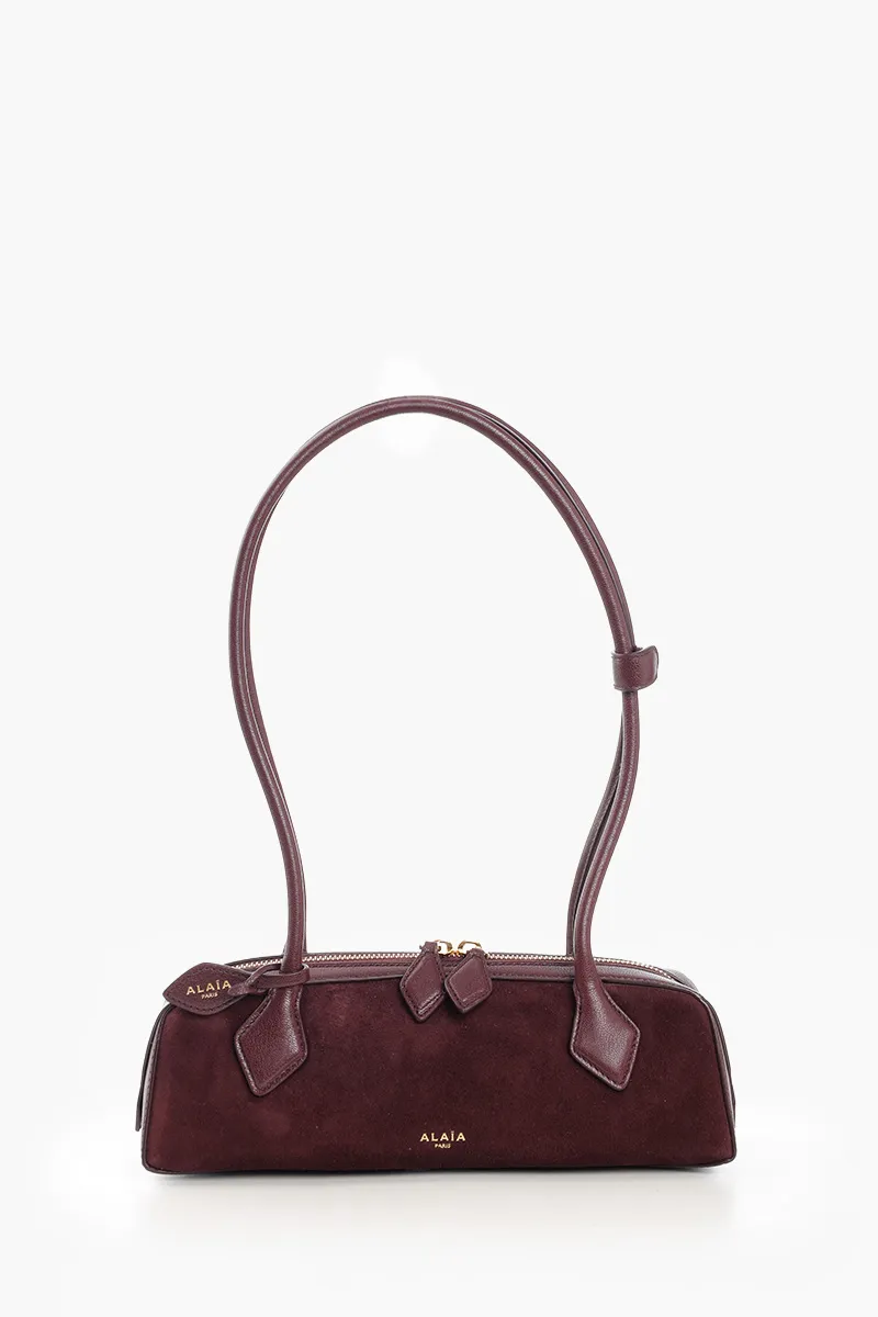 ALAIA Small Le Teckel Shoulder Bag in Rouge Grenat Suede x Shiny Goatskin