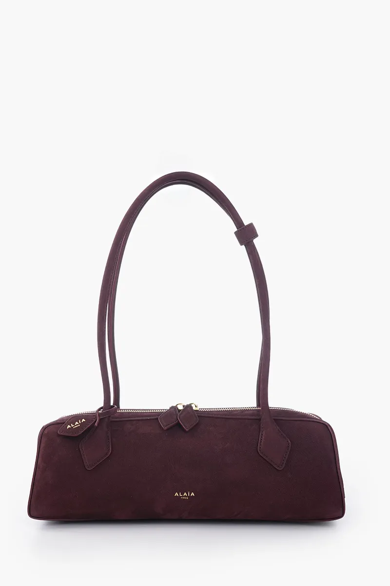 ALAIA Le Teckel Medium Bag in Burgundy Nubuck