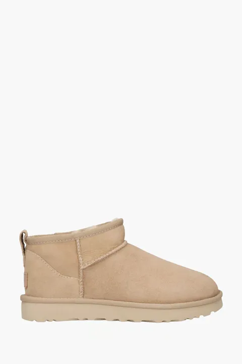 UGG Women Classic Ultra Mini Ankle Boots in Sand Suede with Logo