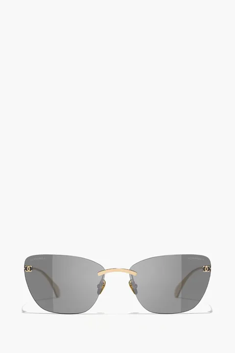 CHANEL Cat Eye Titanium Sunglasses in Gold/Dark Grey with Logo